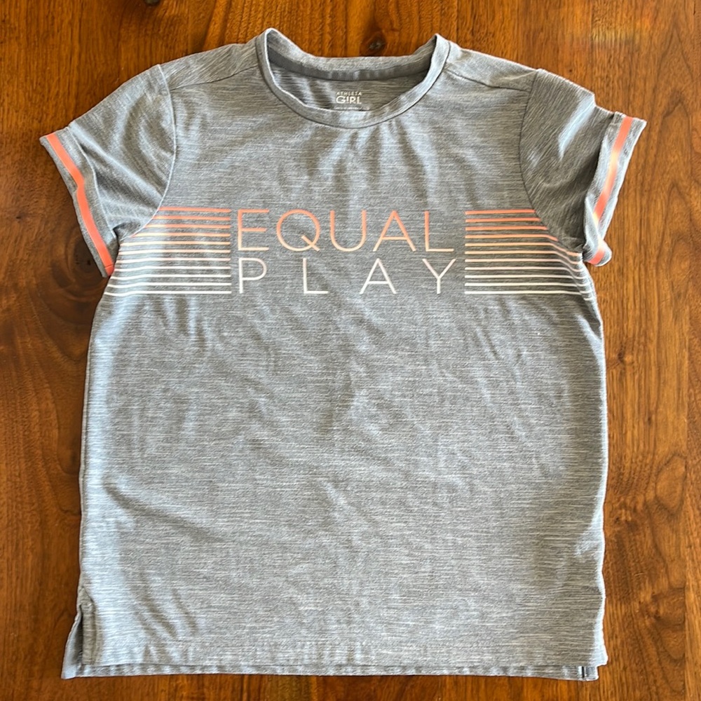 Athleta Girl “EQUAL PLAY” Tech Material T-Shirt Size 8-10 (Medium)